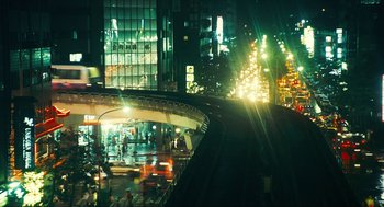 Movie still from “Happy Together” (1997), directed by Kar-Wai Wong – A view of a city at night from a building; Extreme Wide shot, High angle