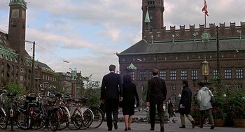 Movie still from “Topaz” (1969), directed by Alfred Hitchcock – A group of people walking down a street; Extreme Wide shot, Low angle