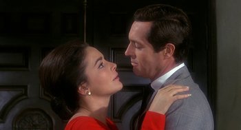 Movie still from “Topaz” (1969), directed by Alfred Hitchcock – A man and a woman are looking into each others eyes; Close Up shot, Low angle