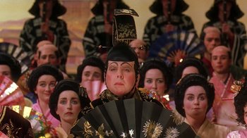 Movie still from “Topsy-Turvy” (1999), directed by Mike Leigh – A group of women dressed in traditional japanese clothing; Close Up shot, Over the shoulder angle