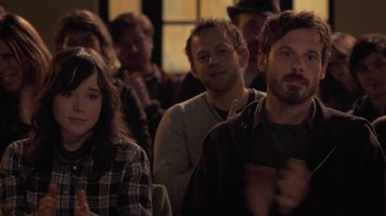 Movie still from “Touchy Feely” (2013), directed by Lynn Shelton – A group of people sitting in front of a window; Close Up shot, Over the shoulder angle