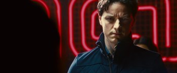 Movie still from “Trance” (2013), directed by Danny Boyle – A person wearing a jacket; Close Up shot, Over the shoulder angle