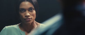 Movie still from “Trance” (2013), directed by Danny Boyle – A person looking at a mirror; Close Up shot, Over the shoulder angle