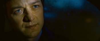 Movie still from “Trance” (2013), directed by Danny Boyle – A man's face with tears coming out of his eyes; Close Up shot, Low angle