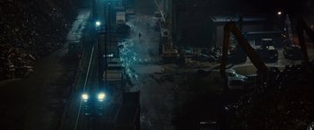 Movie still from “Trance” (2013), directed by Danny Boyle – An aerial view of a construction site at night; Extreme Wide shot, High angle
