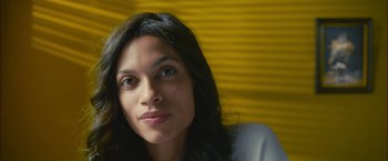 Movie still from “Trance” (2013), directed by Danny Boyle – A person with long black hair; Close Up shot, Low angle