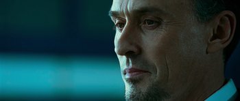 Movie still from “Transporter 3” (2008), directed by Olivier Megaton – A man's face with a beard; Close Up shot, Low angle