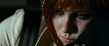 Movie still from “Transporter 3” (2008), directed by Olivier Megaton – A person with red hair; Extreme Close Up shot, Low angle