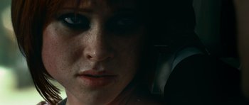 Movie still from “Transporter 3” (2008), directed by Olivier Megaton – A woman's face in the dark; Extreme Close Up shot, Overhead angle