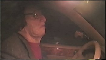 Movie still from “Trash Humpers” (2009), directed by Harmony Korine – An old man sitting in the driver's seat of a car; Close Up shot, High angle