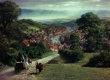 Movie still from “Treasure Island” (1950), directed by Byron Haskin – An oil painting of a town with horses and carriages on it; Extreme Wide shot, High angle