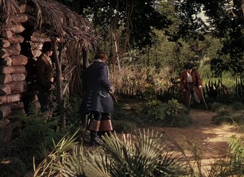 Movie still from “Treasure Island” (1950), directed by Byron Haskin – Two men in medieval garb in the woods; Extreme Wide shot, High angle