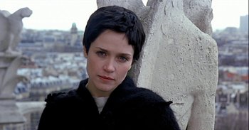 Movie still from “Trouble Every Day” (2001), directed by Claire Denis – A person with short black hair; Close Up shot, High angle