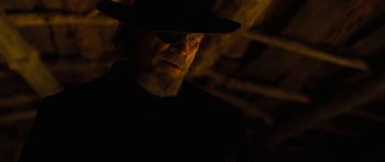 Movie still from “True Grit” (2010), directed by Ethan Coen – A person wearing a hat; Close Up shot, Over the shoulder angle