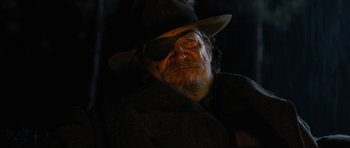 Movie still from “True Grit” (2010), directed by Ethan Coen – An old man with a hat and eye patch; Close Up shot, Low angle
