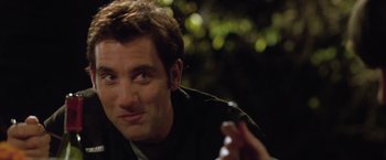 Movie still from “Trust” (2010), directed by David Schwimmer – A person holding a game controller; Close Up shot, Over the shoulder angle