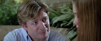 Movie still from “Trust” (2010), directed by David Schwimmer – A person wearing a dress shirt; Close Up shot, Over the shoulder angle