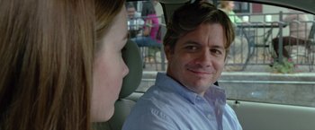 Movie still from “Trust” (2010), directed by David Schwimmer – A man and a woman sitting in the back of a car; Close Up shot, Over the shoulder angle