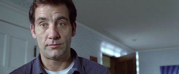 Movie still from “Trust” (2010), directed by David Schwimmer – A person looking at the camera; Close Up shot, Low angle