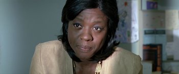 Movie still from “Trust” (2010), directed by David Schwimmer – A person wearing a yellow shirt; Close Up shot, Over the shoulder angle