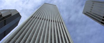 Movie still from “Trust” (2010), directed by David Schwimmer – Looking up at a very tall skyscraper in the sky; Extreme Wide shot, Low angle