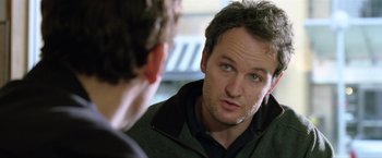 Movie still from “Trust” (2010), directed by David Schwimmer – A person looking at a person in a mirror; Close Up shot, Over the shoulder angle