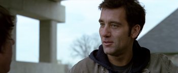 Movie still from “Trust” (2010), directed by David Schwimmer – A person wearing a jacket; Close Up shot, Over the shoulder angle