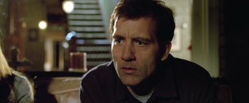 Movie still from “Trust” (2010), directed by David Schwimmer – A person sitting on the ground; Close Up shot, Low angle