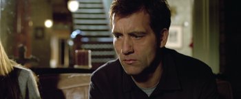 Movie still from “Trust” (2010), directed by David Schwimmer – A person sitting in front of a window; Close Up shot, Low angle
