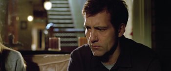 Movie still from “Trust” (2010), directed by David Schwimmer – A person sitting on a couch; Close Up shot, Low angle