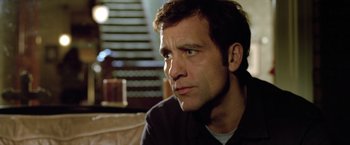 Movie still from “Trust” (2010), directed by David Schwimmer – A person sitting on a couch; Close Up shot, Low angle