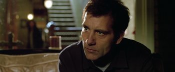 Movie still from “Trust” (2010), directed by David Schwimmer – A person sitting on the ground; Close Up shot, Low angle