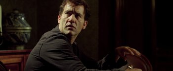 Movie still from “Trust” (2010), directed by David Schwimmer – A person wearing a black shirt; Close Up shot, Low angle