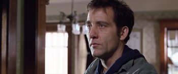 Movie still from “Trust” (2010), directed by David Schwimmer – A person looking at the camera; Close Up shot, Low angle