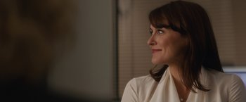 Movie still from “Truth” (2015), directed by James Vanderbilt – A person wearing a white shirt; Close Up shot, Over the shoulder angle