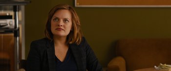 Movie still from “Truth” (2015), directed by James Vanderbilt – A person sitting in a room; Close Up shot, Over the shoulder angle