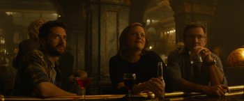 Movie still from “Truth” (2015), directed by James Vanderbilt – A woman sitting at a table with a glass of red wine; Medium shot, Over the shoulder angle