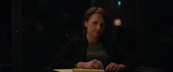 Movie still from “Truth” (2015), directed by James Vanderbilt – A woman sitting at a table with papers in front of her; Medium shot, Over the shoulder angle