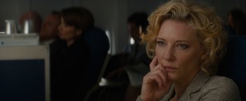 Movie still from “Truth” (2015), directed by James Vanderbilt – A person sitting on a chair; Close Up shot, Over the shoulder angle
