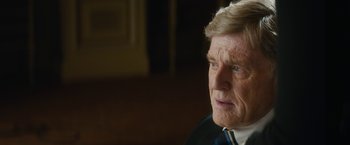 Movie still from “Truth” (2015), directed by James Vanderbilt – An older man looking at something in the distance; Close Up shot, Over the shoulder angle