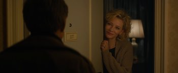 Movie still from “Truth” (2015), directed by James Vanderbilt – A woman standing in front of a door looking into a mirror; Close Up shot, Over the shoulder angle