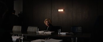 Movie still from “Truth” (2015), directed by James Vanderbilt – A woman sitting at a table in front of a laptop; Medium shot, Over the shoulder angle