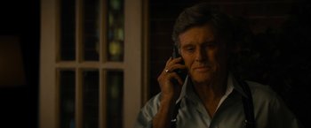 Movie still from “Truth” (2015), directed by James Vanderbilt – An older man talking on a cell phone; Close Up shot, Over the shoulder angle