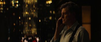 Movie still from “Truth” (2015), directed by James Vanderbilt – An older man talking on a cell phone in the dark; Close Up shot, High angle