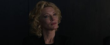 Movie still from “Truth” (2015), directed by James Vanderbilt – A person with curly hair; Close Up shot, Low angle