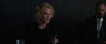 Movie still from “Truth” (2015), directed by James Vanderbilt – A woman in a black jacket is looking at the camera; Close Up shot, Over the shoulder angle
