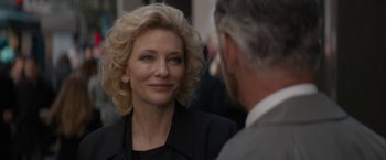 Movie still from “Truth” (2015), directed by James Vanderbilt – A woman in a black jacket is talking to a man in a suit; Close Up shot, Over the shoulder angle