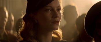 Movie still from “Tucker: The Man and His Dream” (1988), directed by Francis Ford Coppola – A person wearing a hat; Close Up shot, Low angle