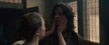 Movie still from “Tulip Fever” (2017), directed by Justin Chadwick – A woman touching the face of a man with long dark hair; Close Up shot, Over the shoulder angle