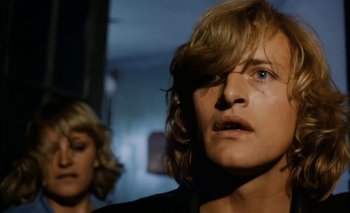 Movie still from “Turkish Delight” (1973), directed by Paul Verhoeven – A man and a woman in a dark room; Close Up shot, Low angle